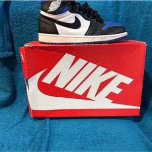 Nike Black and White High-Tops with Blue Accents